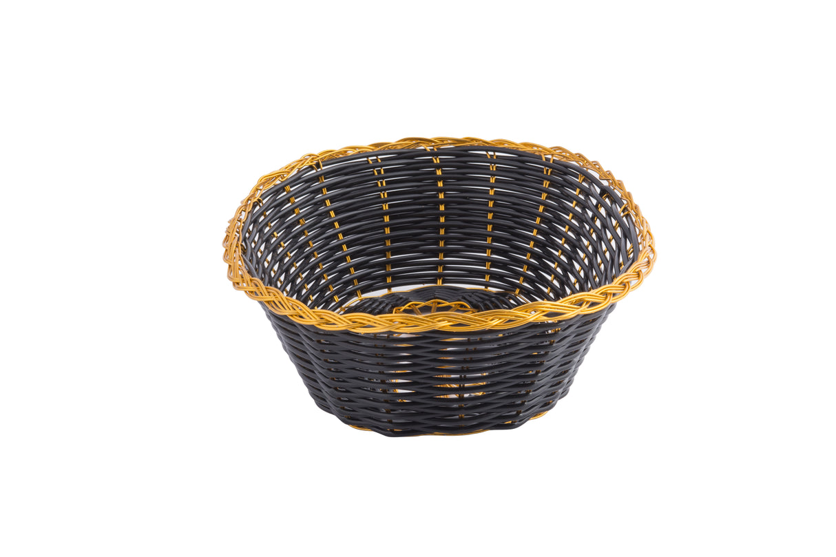 A round, empty hand-woven basket with a black body and gold trim is shown on a white background. Photographed from a slightly elevated angle, the open top displays its intricate interior weaving pattern.