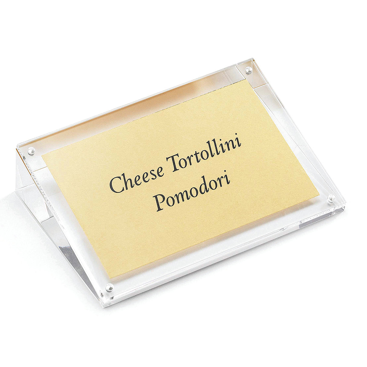 A clear acrylic sign holder, angled on a white surface, neatly displays a tan card with black text reading Cheese Tortellini Pomodori. This acrylic sign holder is dishwasher safe for easy cleaning and maintenance.