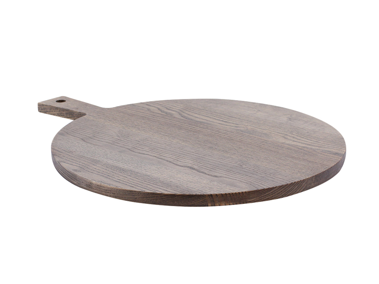 A round Ashwood paddle board with a handle and a small hole near the end. This TableCraft serving board features a smooth, light brown surface with visible wood grain patterns, photographed against a plain white background.