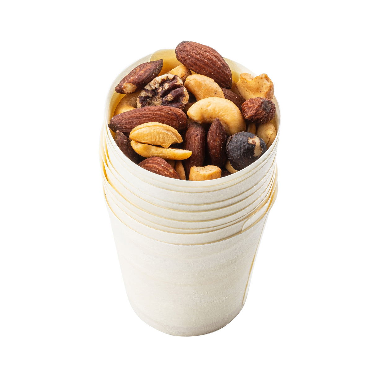 A small stack of eco-friendly, light-colored disposable serving cups filled with a mix of almonds, cashews, walnuts, and hazelnuts sits on a white background. The biodegradable cups are neatly nested, showcasing the nuts on top.