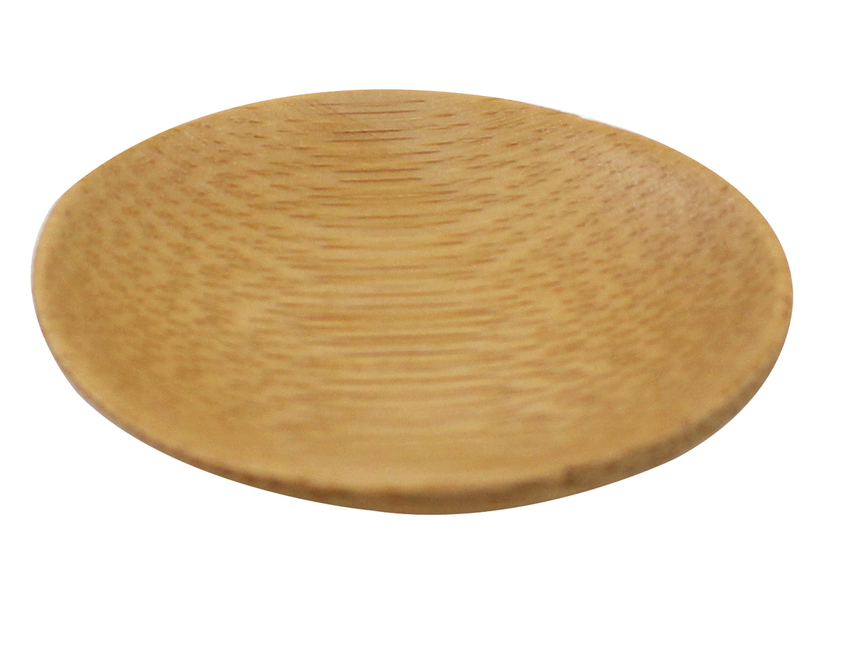 A small, round, shallow eco-friendly plate with a smooth surface and visible wood grain pattern, photographed on a plain white background. The plate’s edges are gently curved upward.