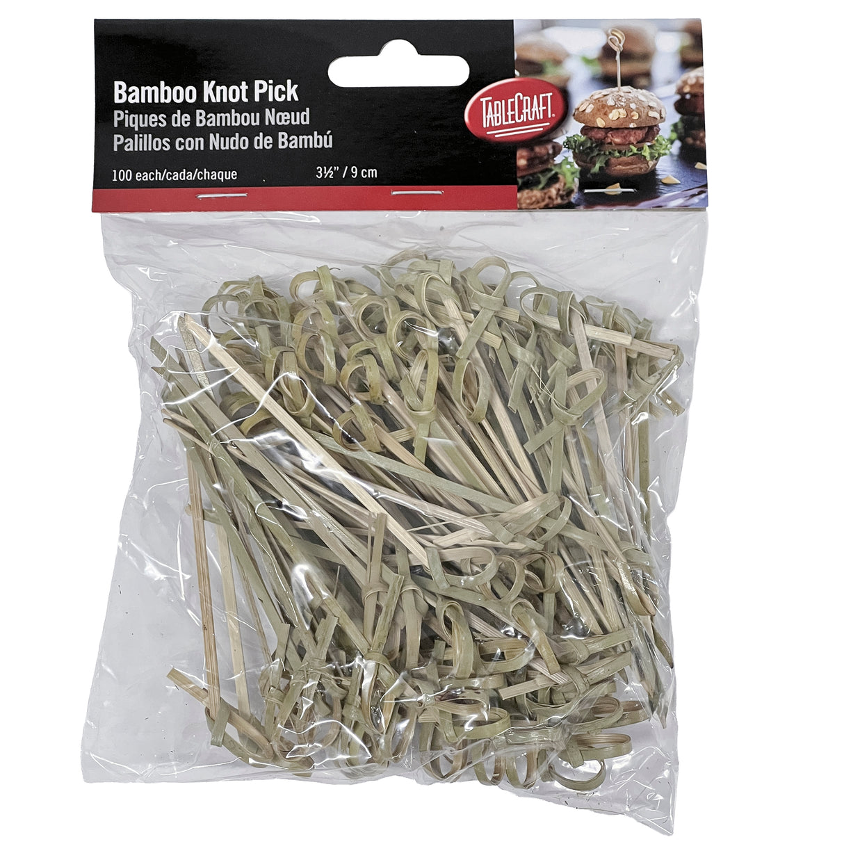 A clear plastic bag of TableCraft bamboo picks, each featuring a looped knot pick design. The red, white, and black label shows sliders with the picks. Includes 100 tan picks; label text is in English, French, and Spanish.