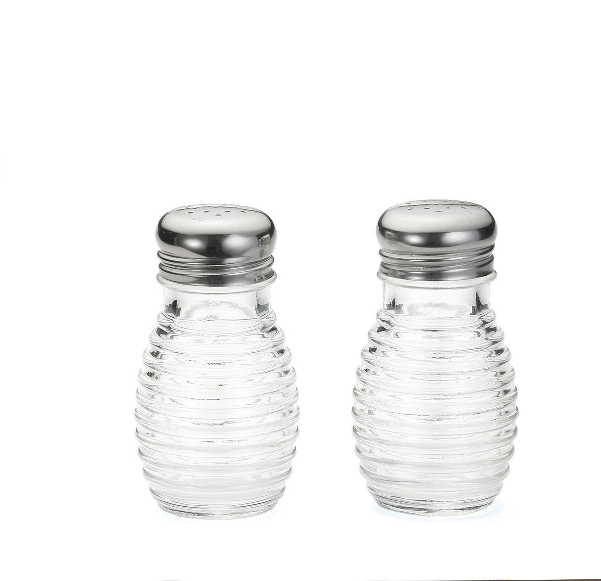 Two identical TableCraft glass salt shakers with ribbed bodies and silver metal tops are filled with white salt. These beehive salt pepper shakers sit side by side on a clean white background.