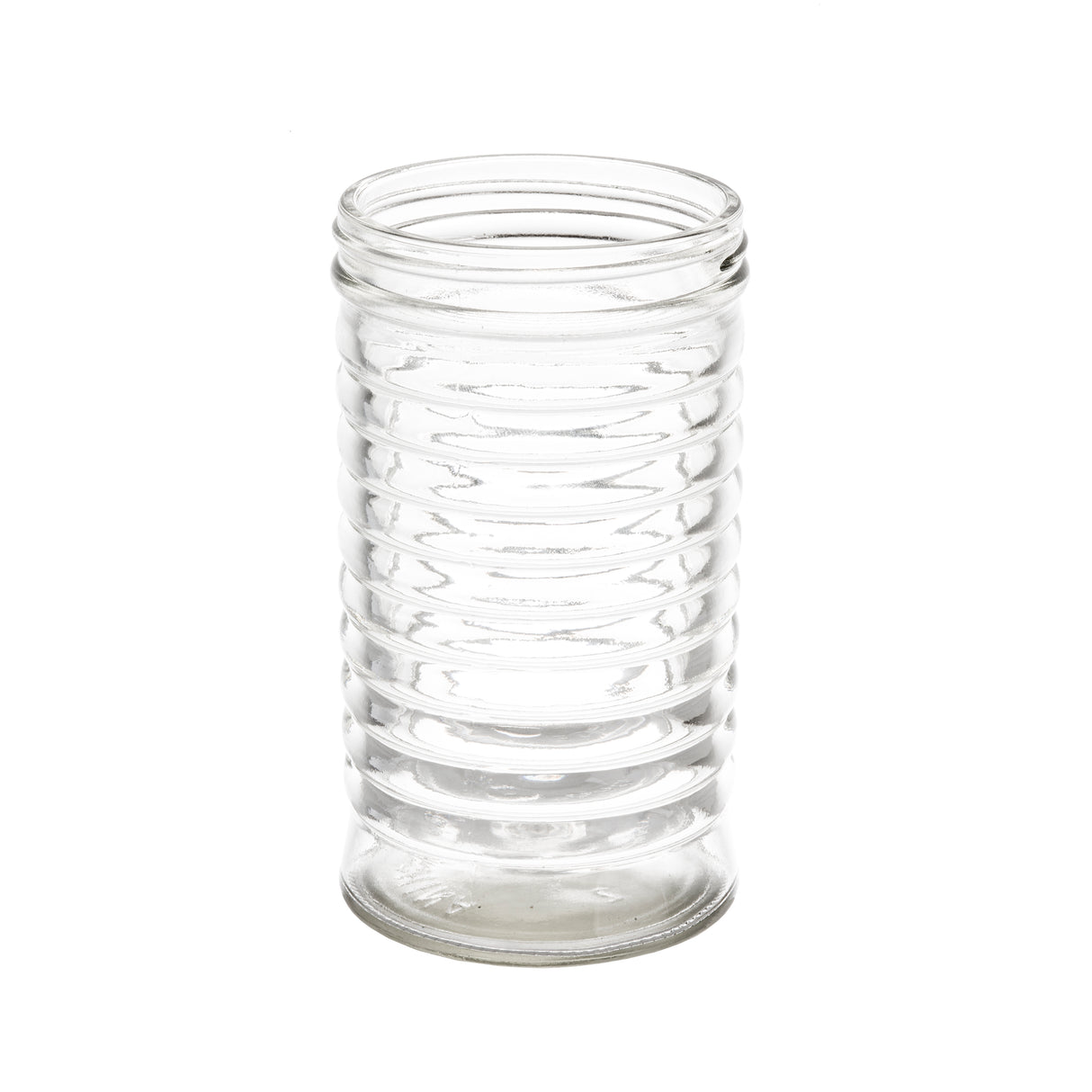 A clear, empty 12 oz glass jar stands upright on a white background. The jar has a cylindrical shape with horizontal ridges wrapping around its body, resembling beehive shakers, and the top is open with smooth, transparent glass.