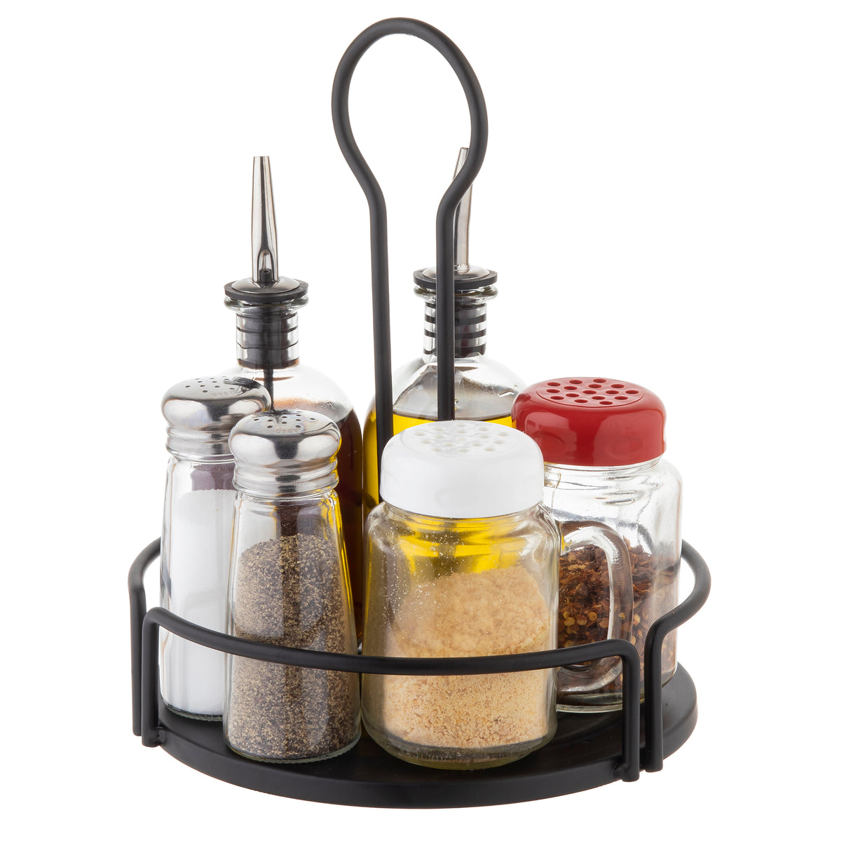 The Versa Rack round black metal caddy serves as a stylish shaker organizer, holding six spice jars: two tall glass bottles with metal spouts for oil and vinegar, plus four shorter shakers for salt, pepper, grated cheese, and red pepper flakes.