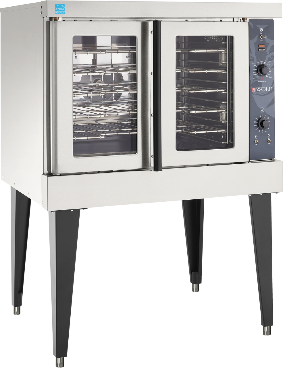 A Wolf WC4ED convection oven on black legs, featuring two clear glass doors. The right side has control knobs and an analog dial with the Wolf logo. The energy-efficient oven interior has multiple racks and a fan for air circulation.
