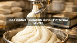 Spiral mixer kneading dough in a bakery, illustrating optimal dough hydration levels