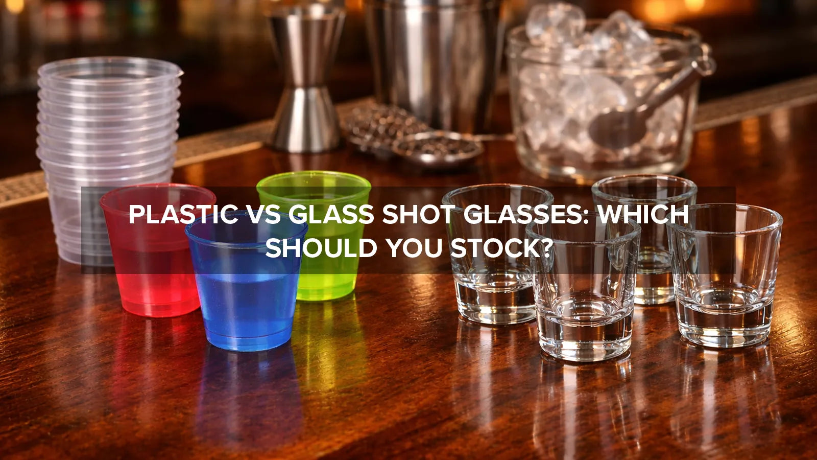 Side-by-side display of plastic and glass shot glasses on a bar top comparing materials