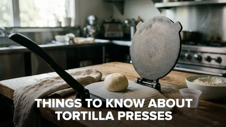  Tortilla press flattening fresh dough in a professional kitchen setting