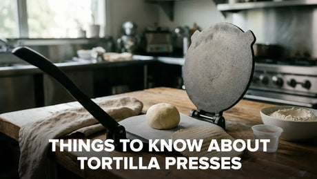  Tortilla press flattening fresh dough in a professional kitchen setting