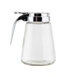 A modern glass dispenser with a 12 oz capacity, featuring a chrome plated metal top and handle. Photographed on a white background, its simple, classic design is perfect for serving syrup or honey. The clear dispenser is empty.