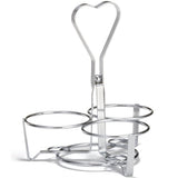 A chrome plated metal egg holder by TableCraft with three circular compartments and a central handle bent into a heart shape. Its open wire design keeps eggs upright and separated, making it as charming as a syrup dispenser rack.