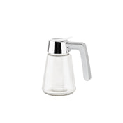 This Modern Glass Dispenser holds 12 oz. and features a wide base, silver metal lid with built-in spout, and an angular handle. Stylish and dishwasher safe, it’s set against a plain white background.