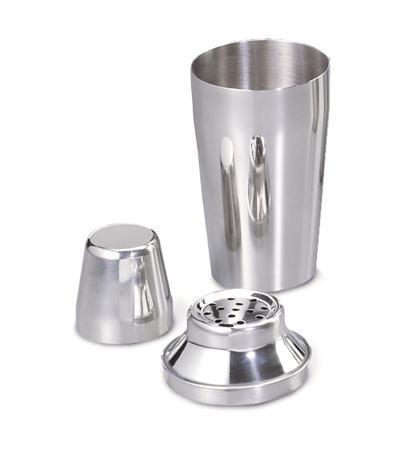 A three-piece 16 oz stainless steel bar shaker set with the cup upright, the fitted strainer in front, and the small cap on its side, all reflecting light on a white background.