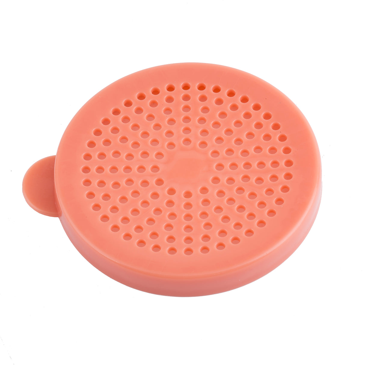 A round, flat, coral-colored silicone disk with a small tab on one side. Made from BPA free material, its surface features evenly spaced holes arranged in concentric circles—perfect for use as a dredge shaker for medium ground spices. Background is plain white.