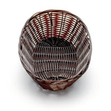 A round, empty basket with a dark brown finish is shown against a plain white background. Hand-woven with polypropylene cord, it features a tightly woven base and more open, evenly spaced weaving along the sides.