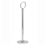 A tall, sleek, chrome-plated metal stand with a round base and a large circular ring at the top, set against a plain white background. This minimalistic and modern TableCraft number stand is ideal for holding paper towels or table numbers.