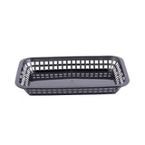 A rectangular black plastic Cash & Carry Grande Basket with open-grid sides and a solid base, photographed on a white background. This dishwasher safe basket has slightly rounded corners and an empty, simple, and functional design.
