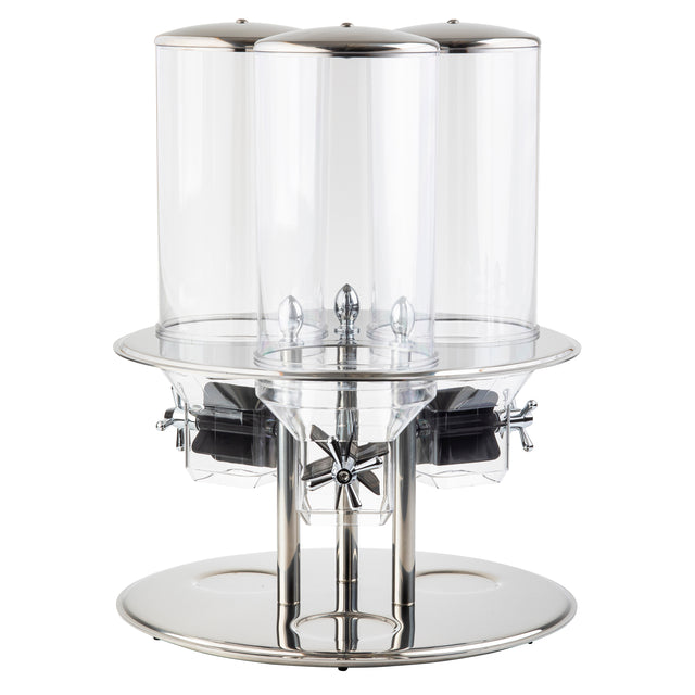 This stainless steel triple cereal dispenser features three clear polycarbonate containers, each with a silver lid and dispensing knob. Its round base and modern, polished design make it ideal for buffet or breakfast setups.
