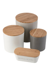Four melamine kitchen canisters with bamboo lids are grouped together. Each canister has a different size and color: gray, white with a subtle pattern, solid gray, and a small white one labeled BUTTER ALL THE THINGS.