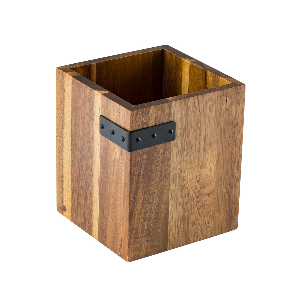 A square, acacia wooden container with a natural finish and visible wood grain patterns. It features a black metal band with rivets on one side and an open top, making it a stylish cutlery holder from the industrial collection.