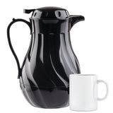 A shiny black 40 oz coffee decanter with triple wall insulation and a curved handle sits next to a plain white coffee mug. The decanter is taller, featuring a wavy pattern, while the mug is simple with a round handle, set against a white background.