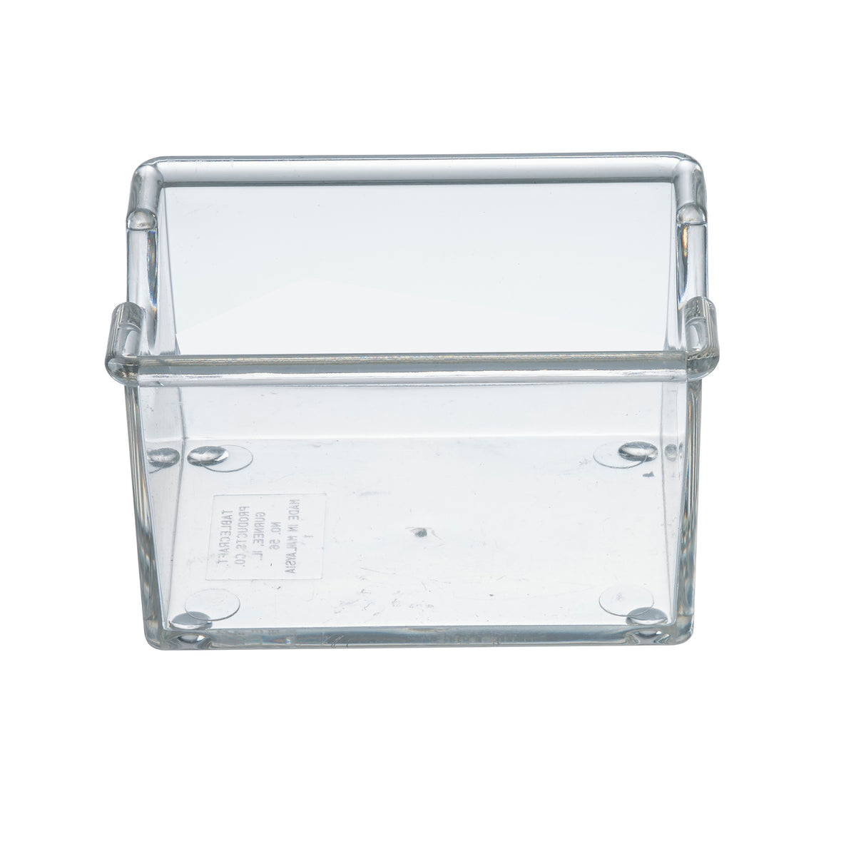 A clear, rectangular polystyrene box with smooth edges, viewed from the front and slightly above. The box is empty, showing a white label inside the base. Four small round feet are visible at each corner—ideal as a sugar packet holder.