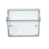 A clear, rectangular polystyrene box with smooth edges, viewed from the front and slightly above. The box is empty, showing a white label inside the base. Four small round feet are visible at each corner—ideal as a sugar packet holder.