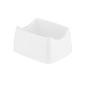 A small, white, rectangular Pulito Collection sugar packet holder with slightly rounded edges and a grooved texture. Featuring half-moon cutouts for easy access, its smooth, glossy ceramic surface is empty and photographed on a white background.