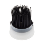 A close-up of a round, white plastic base with densely packed, upright black bristles, resembling a silicone basting brush attachment—ideal for pairing with a squeeze bottle basting brush. The object sits against a plain white background.