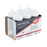 Six empty, clear polyethylene WideMouth Squeeze Bottles with white caps are held in a brown cardboard holder. The label highlights features like dishwasher safe and 16 oz (473 ml) capacity. Bottles are upright in two rows.