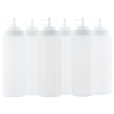 Six clear, plastic WideMouth Squeeze Bottles with white nozzle caps are arranged side by side against a white background. Each dishwasher safe bottle has a pointed tip, a small cover for sealing the nozzle, and is identical in size and shape.