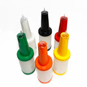 Six Quart Pourmaster plastic bottles with polyethylene pour spouts and assorted color storage caps—white, black, red, green, orange, and yellow—are arranged in a circle on a white background. Each bottle features a white label.