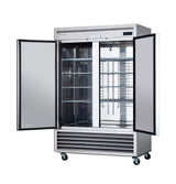A commercial two-section reach-in refrigerator with stainless steel construction features two open glass doors revealing metal shelves. The unit stands on wheels, has a vented panel below, and a digital control panel on the upper right corner.