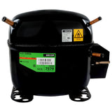 A black Secop compressor, used in Empura Ice Machines like the E-MCF430, features copper pipe fittings, green and yellow labels for model SCE15MNX and refrigerant R290, mounting feet at its base, and an electrical terminal cover on the right side.