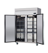 A large two-section stainless steel reach-in refrigerator stands on wheels, both doors open to reveal multiple adjustable wire shelves. The smooth, reflective surface and spacious interior are clearly visible against a plain white background.