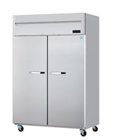 A large, stainless steel two-section refrigerator with tall doors, horizontal handles, a digital display on the upper right, and four caster wheels for mobility. Its sleek, industrial design is ideal for professional kitchens.