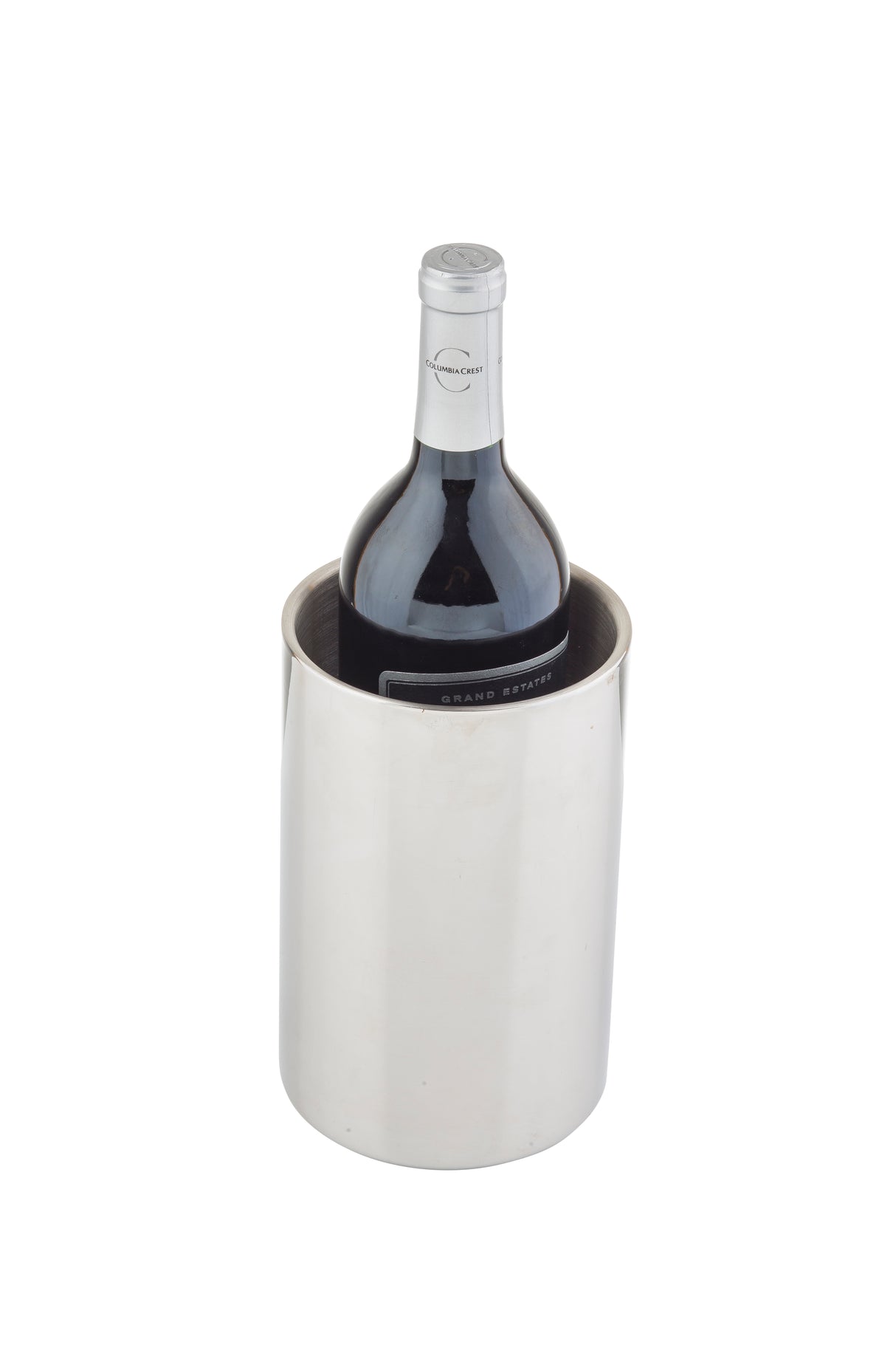 A dark wine bottle with a silver foil top rests inside a shiny, double wall stainless steel Wine Server on a white background. The cylindrical, reflective cooler keeps the wine perfectly chilled.