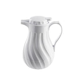 A white TableCraft coffee decanter with triple wall insulation, featuring a curved handle, textured wave-like grooves, and a short spout. The lid has a small tab for easy opening. The background is plain white.