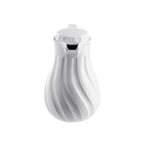 A white, glossy, sculpted TableCraft pitcher with a curvy swirl pattern and spout. Bulbous at the base and narrowing to the top with a fitted lid, this modern coffee decanter features sleek lines and triple wall insulation for lasting temperature control.