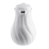A glossy white Coffee Decanter with a curvy, bulbous body and sculpted swirling ridges features triple wall insulation. Its short spout and rounded lid with a small knob on top give it a modern, elegant appearance against a plain white background.
