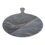 A round, flat serving paddle with a handle and a small hole at the end. The board features natural, flowing gray and brown veining patterns across its surface, giving it a unique, elegant appearance.