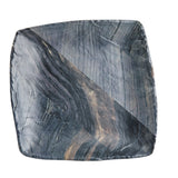 A square ceramic serving tray with slightly rounded edges, featuring a marbled barnwood pattern in dark gray, black, and brown. The glossy surface has subtle reflections, set against a plain white background.
