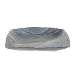 Rectangular, shallow melamine serving tray with a wavy, textured surface. The glazed finish in shades of gray and blue resembles natural stone or water ripples, while gently curved edges create a modern, organic look.