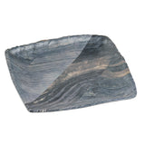 A rectangular ceramic serving tray with gently curved edges, featuring a marbled pattern in dark blue, gray, and white tones. The surface has a textured, wavy appearance, and the plate is photographed on a white background.