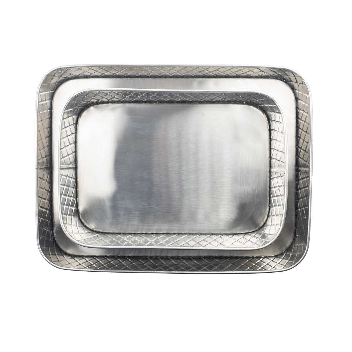 Three rectangular, stainless steel platters from the TableCraft Lattice Collection are nested inside each other. Their shiny, reflective surfaces with a diamond-patterned border stand out against the plain white background, emphasizing their elegant design.