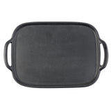 A rectangular, flat, black TableCraft tray with rounded edges and two large handles on opposite sides. The smooth, uncoated cooking surface is designed for stovetop or oven use. The image is taken from a top-down perspective on a white background.