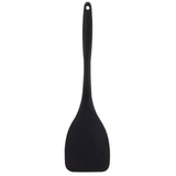 A black silicone spatula with a flat, wide blade and a long handle featuring a small hole for hanging. The spatula is plain, with a silicone handle, and photographed against a white background.