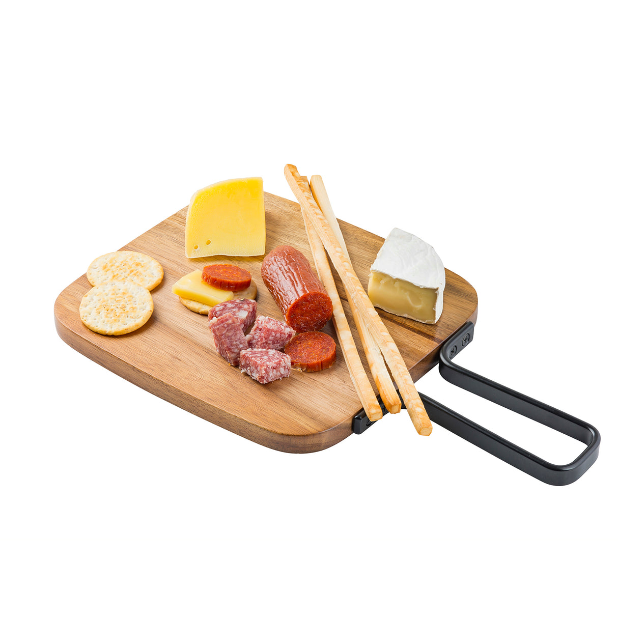A TableCraft serving paddle with a black handle holds three cheeses, sliced and whole salami, two breadsticks, round crackers, and chorizo slices, all artfully arranged on a white background.