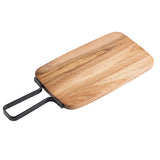 A rectangular acacia serving paddle with rounded edges and a smooth surface, featuring a black metal handle with a rectangular loop design. The natural, light brown grain pattern adds charm to this stylish TableCraft serving paddle.
